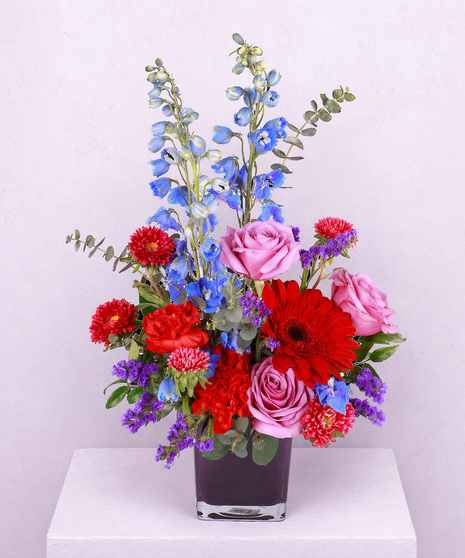 Delphinium, Rose and Much More Arrangement